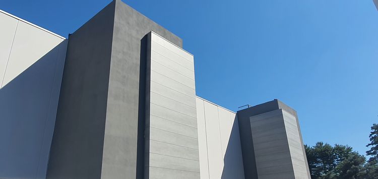 Rivestimento su riqualificazione edificio Il Gigante